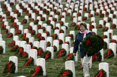 Anne Weems walks among grave sites at Arlington National Cemetery in Virginia